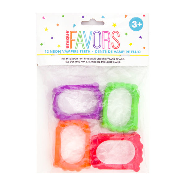 PLASTIC NEON VAMPIRE TEETH